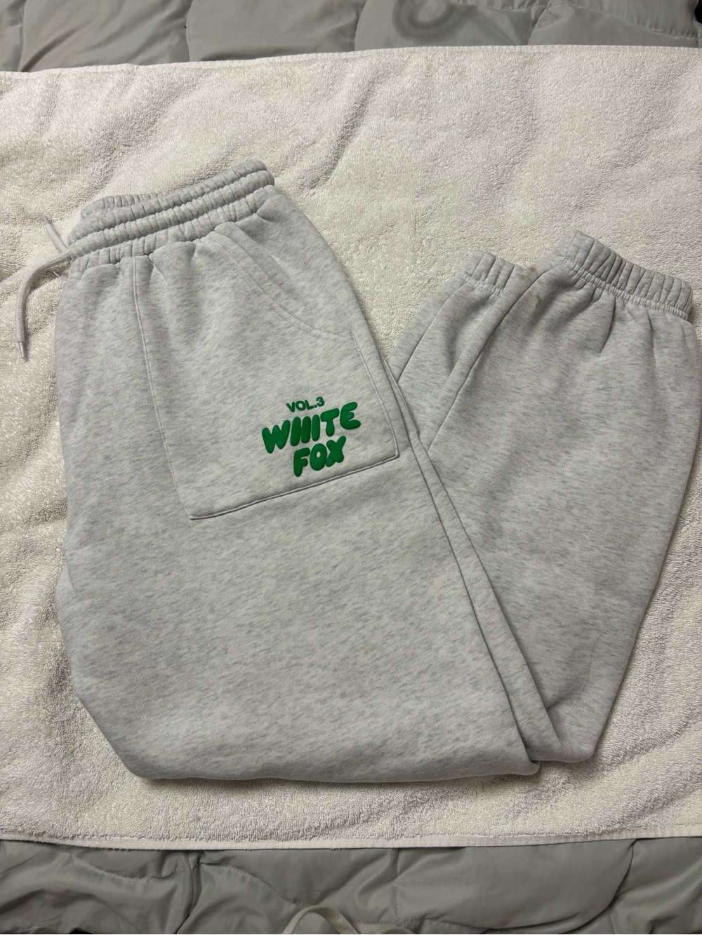 White Fox Sweatpants with Green Logo